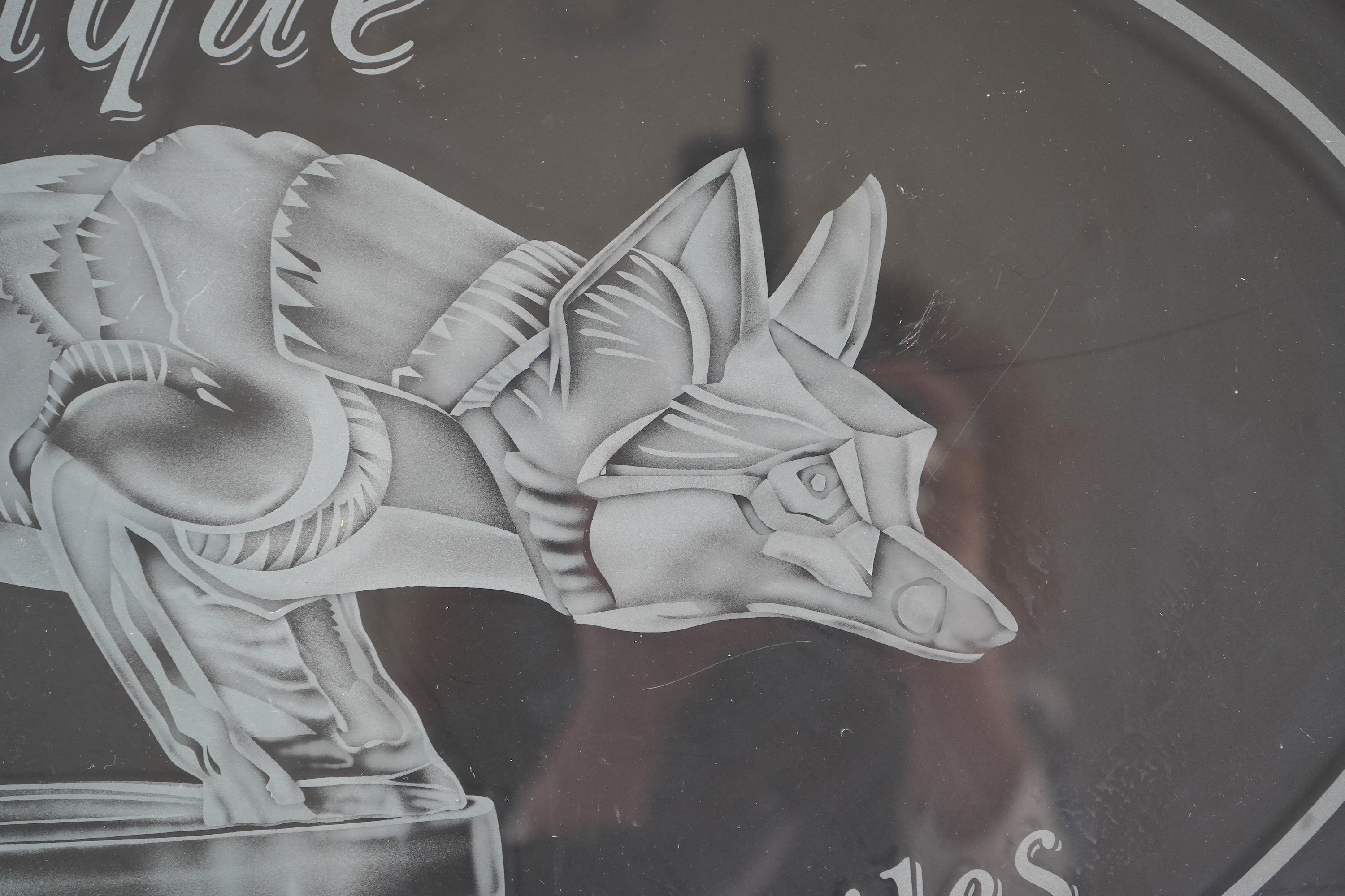 A rare boutique advertising hanging glass sign for Lalique